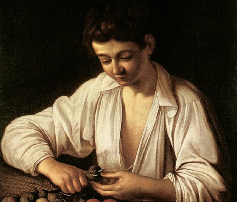 Boy Peeling a Fruit